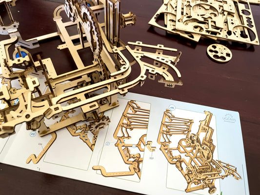 Wooden mechanical model made from flat parts