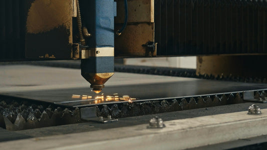 Industrial laser cutting a metal part